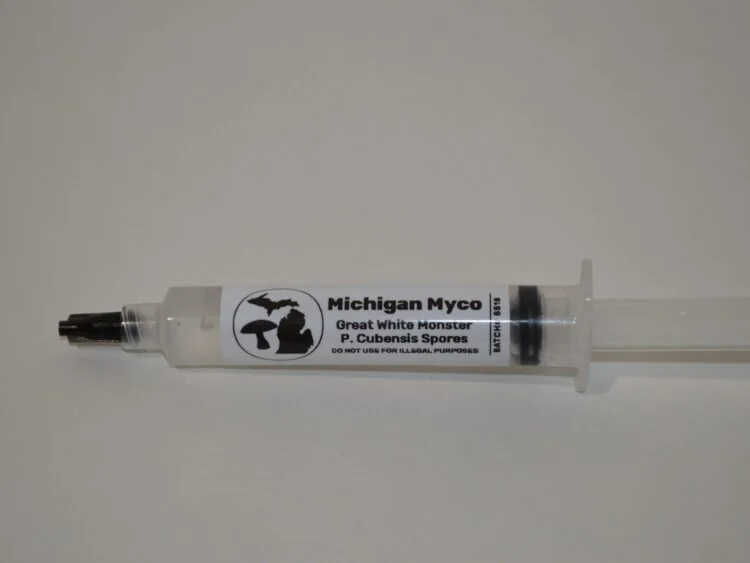 Official Michigan Myco source image: Great White Monster Spore Syringe Close.